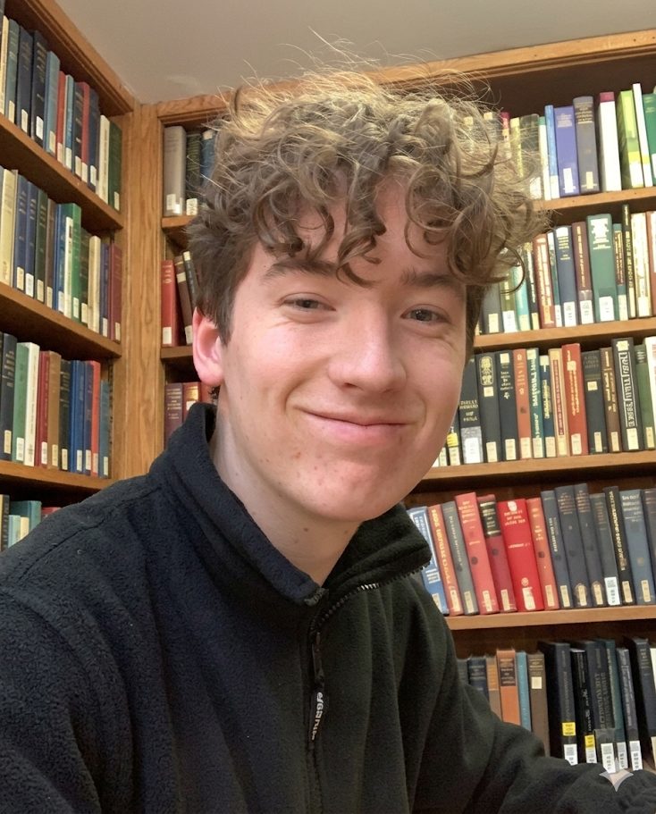 Evan in the college library